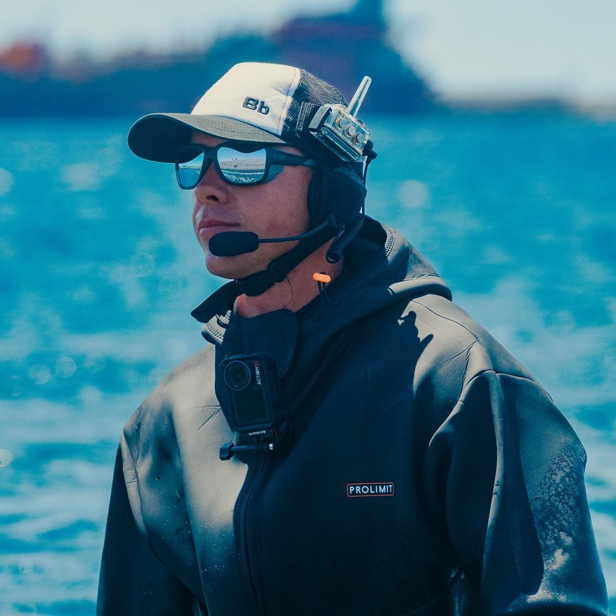Martin, wingfoil coach at Acoran Foil, on the water at El Médano with his radio headset