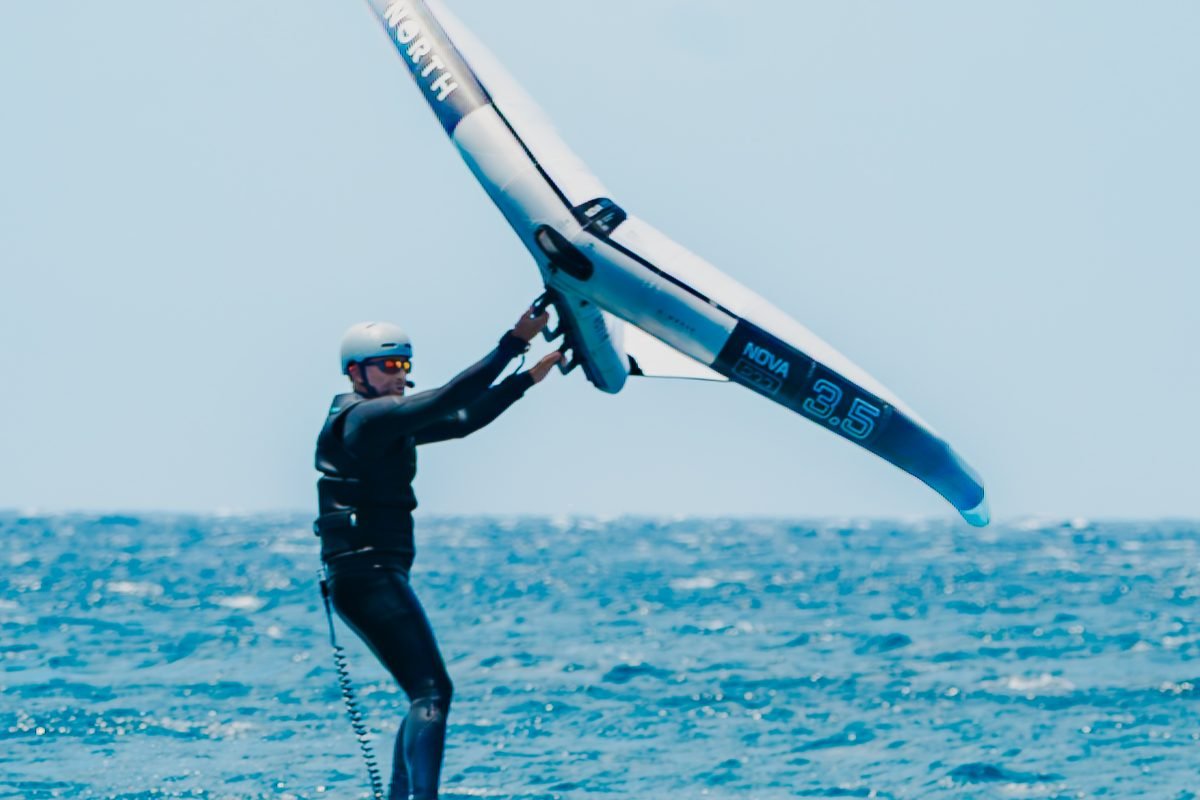 Rider getting the wing under control on a large, stable board